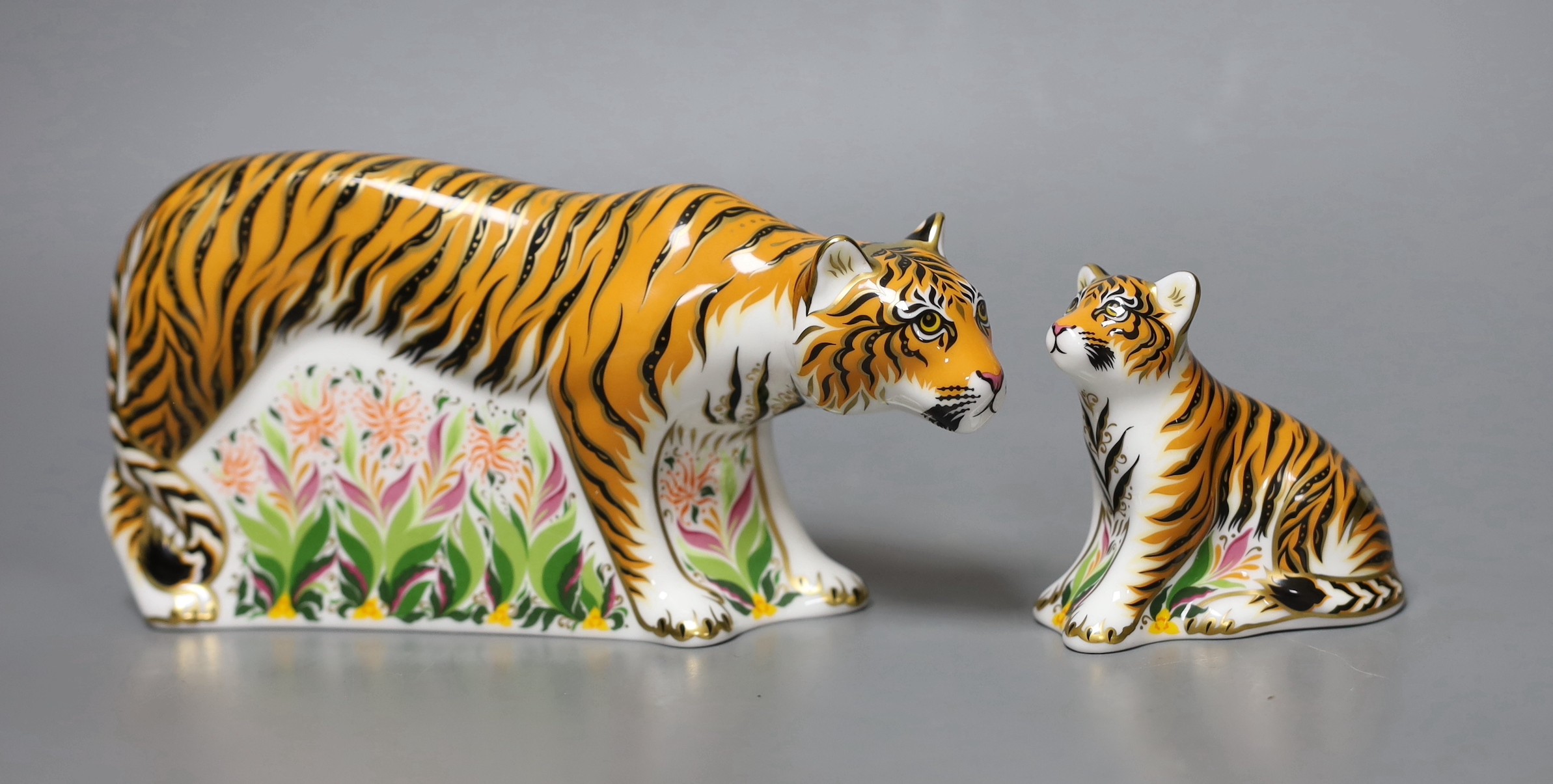 Two Royal Crown Derby paperweights - Sumatran Tigress, gold stopper, boxed with certificate and Sumatran Tiger Cub, gold stopper, boxed with certificate